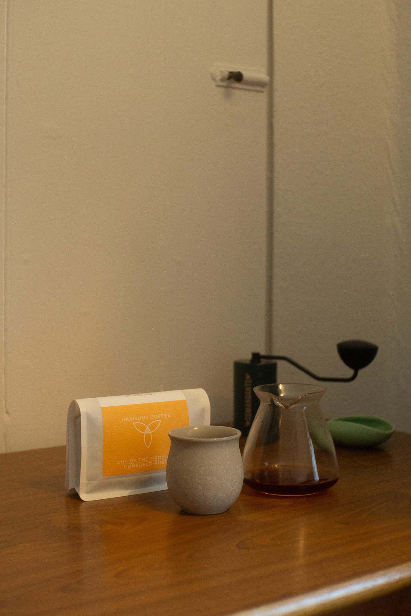 Arrangement of Consuelo Rubio on table with cup and carafe