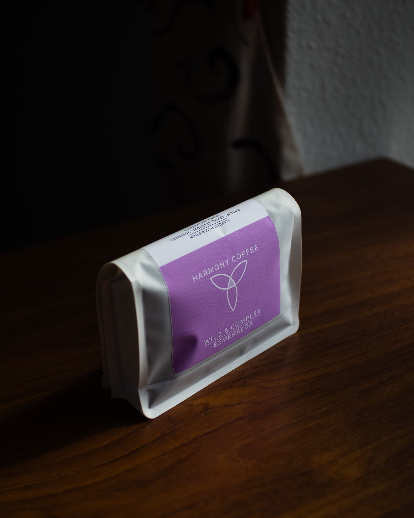 Bag of coffee from Finca la Esmeralda on tabletop