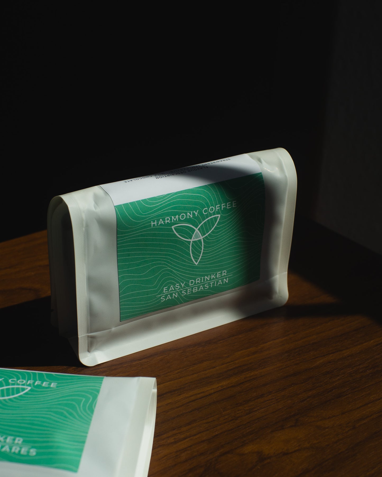 Bag of San Sebastián coffee by Harmony Coffee York on a wooden surface