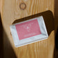 Harmony Coffee package on a wooden surface