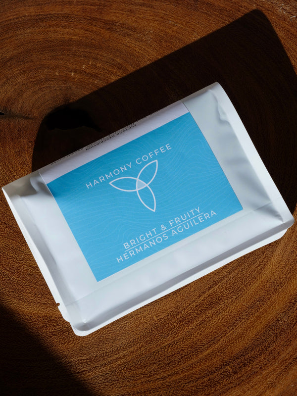 Harmony Coffee package on a wooden surface