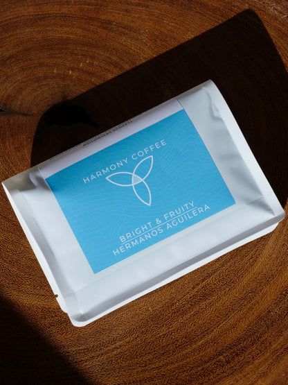 Harmony Coffee package on a wooden surface