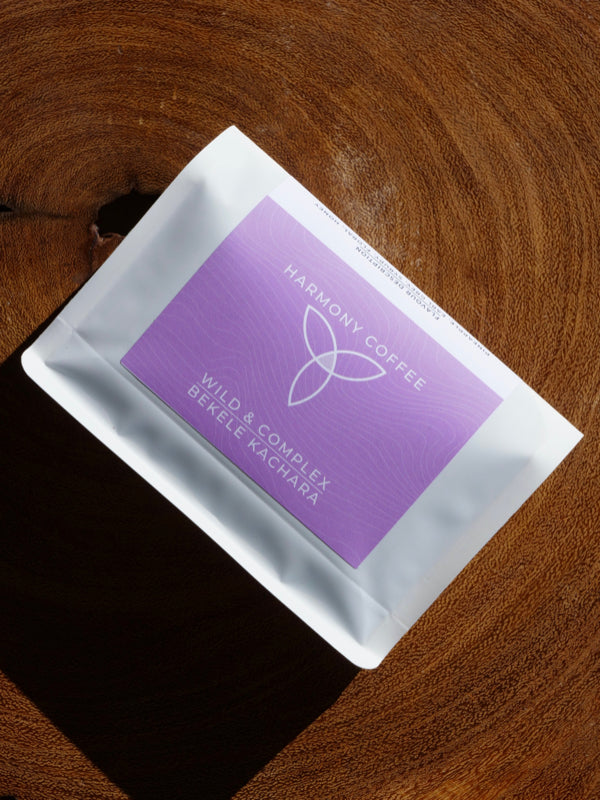 BEKELE KACHARA bag of Ethiopian Natural coffee on a wooden surface