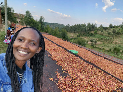 Bernice sorting coffee cherries at Mbare
