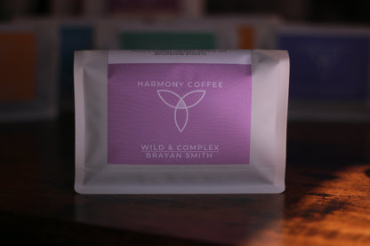 Brayan Smith - Harmony Coffee package with a purple label on a dark background