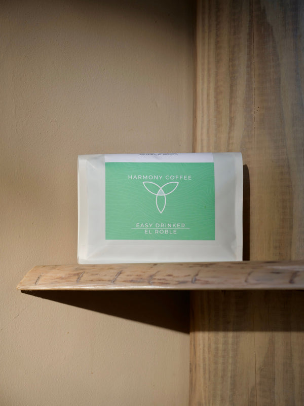 El Roble by Dylan Aguilera - Single Origin Costa Rican coffee sat on a wooden shelf in good lighting. Roasted By Harmony Coffee York