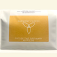 Harmony Coffee package with gold label on a beige background