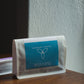 Harmony Coffee bag of Migoti Lot 228 Washed Burundi with blue label on a wooden surface