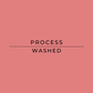 A solid dusty rose pink square graphic with the words 'PROCESS WASHED' centered in black sans-serif text, divided by a horizontal black line.