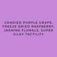 A solid purple square with centered black text reading: 'CANDIED PURPLE GRAPE, FREEZE DRIED RASPBERRY, JASMINE FLORALS, SUPER SILKY TACTILITY'.