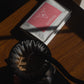 Coffee filter with ground coffee and a package of Sidra coffee from Ecuador on a wooden surface.