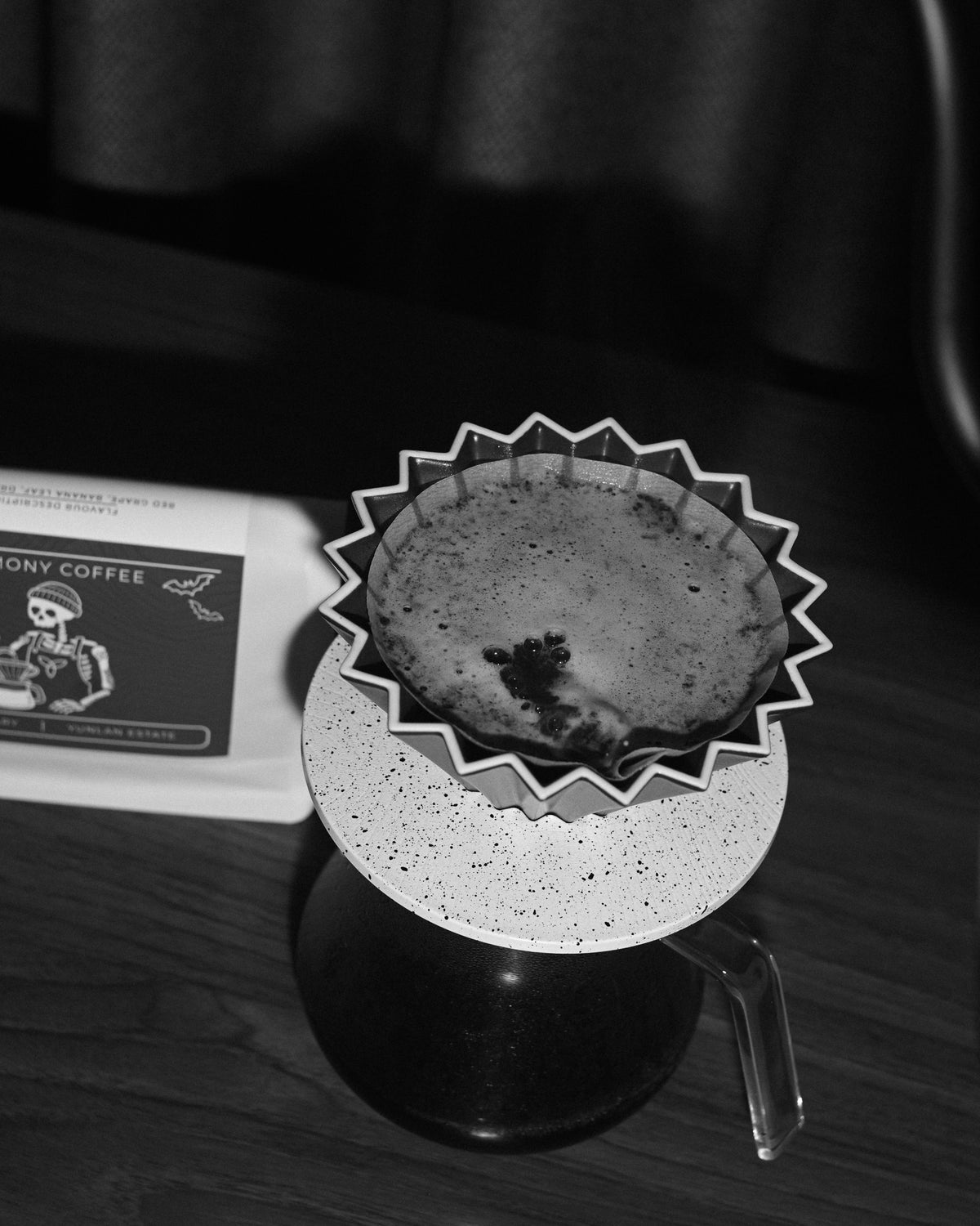 Coffee bed blooming in a paper filter while brewing YunLan Estate as a pour-over